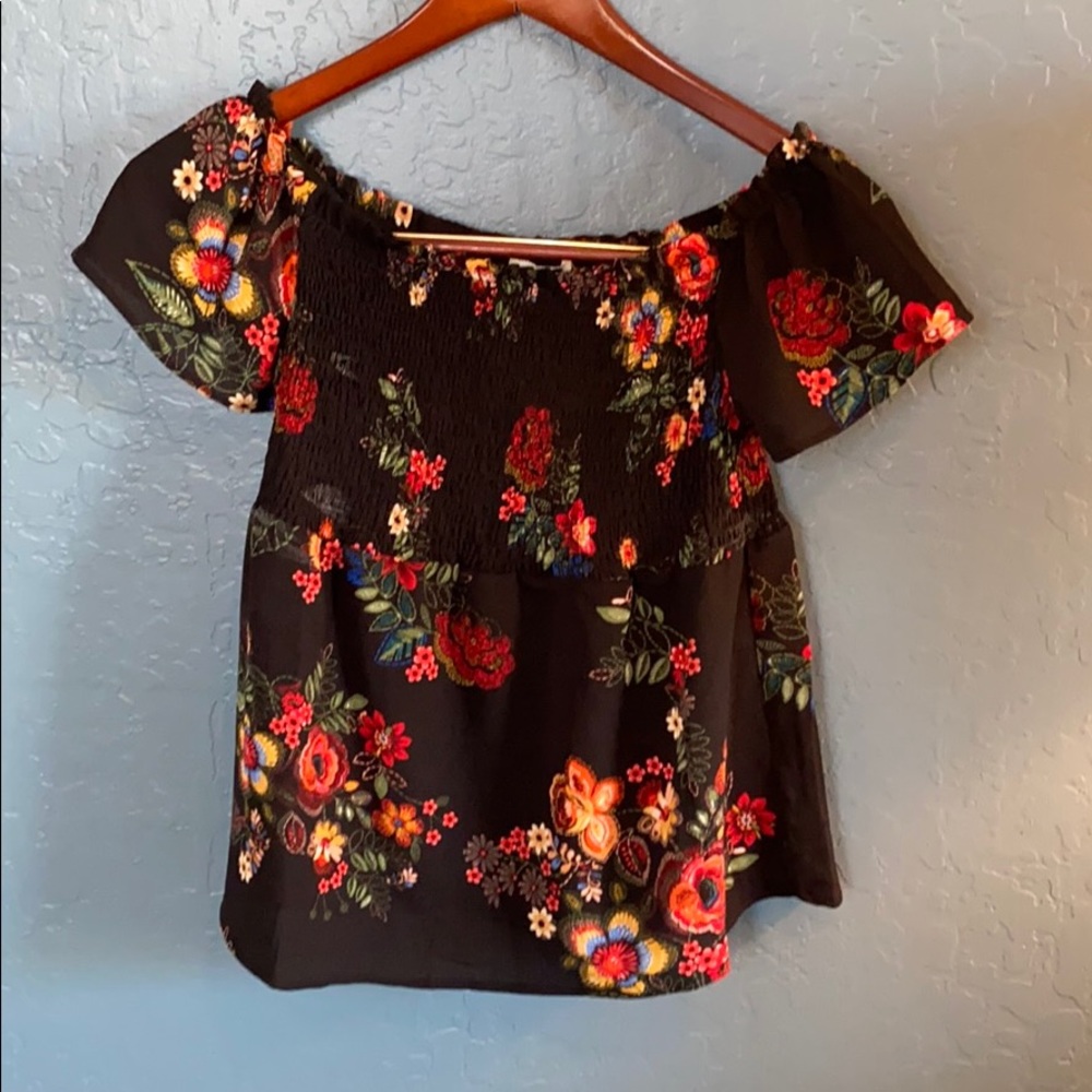 Women’s floral off the shoulder shirt.